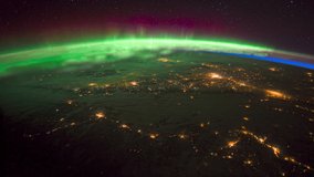 ISS Time-lapse Video of Earth seen from the International Space Station with dark sky and Aurora Borealis at night over Canada, Time Lapse Full HD. Images courtesy of NASA.