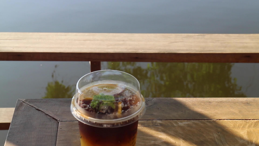 Coffee time at water pond cafe, stock footage
