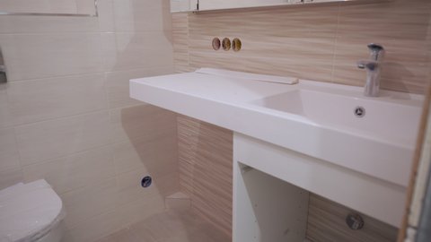 Interior of bathroom in new apartment during remodeling, renovation, reconstruction, restoration and construction.