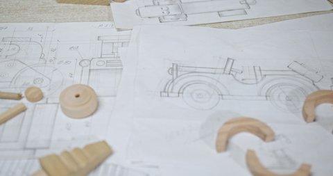 Drawings of children's wooden toys of cars with fitting details from a carpenter who makes eco handmade products for sale in handmade stores