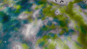 Close-Up Slow Motion Footage of Colorful Car Wash Soap Slides Sliding Down the Front of a Windshield