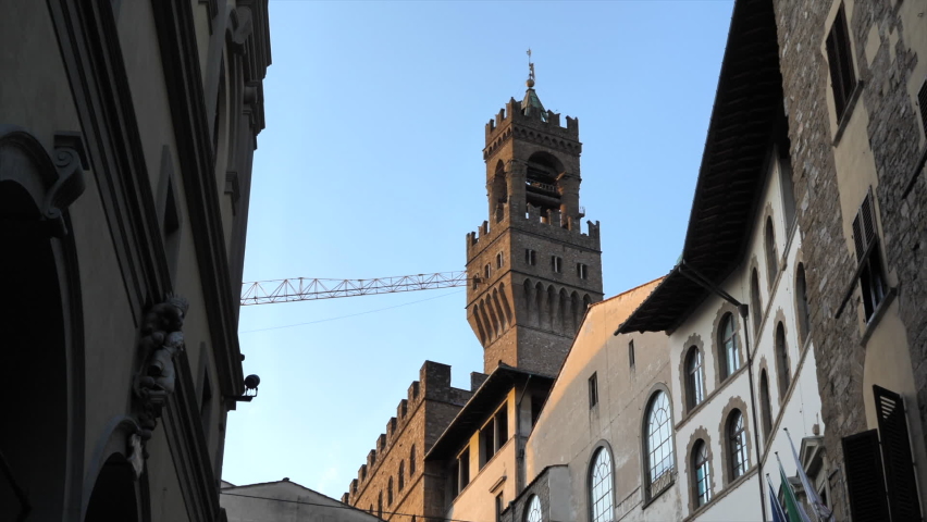 Tower of Palazzo Vecchio Seen from Florence Old Town Streets, Zoom In.