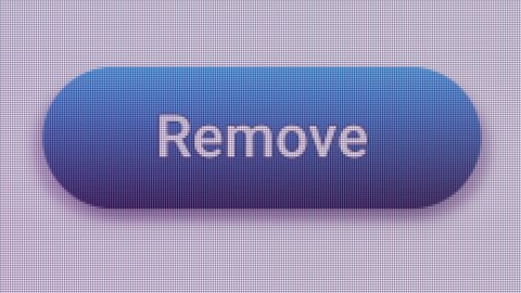 Remove Button Click Extreme Close Up Front View 
A command button on a computer screen which delete files completely or erases text.