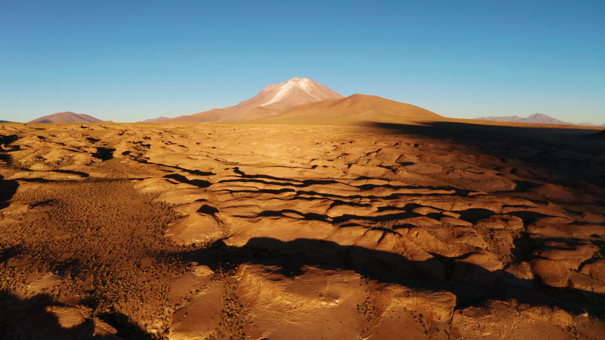 Aerial view of the volcanic landscape in Bolivia. Altiplano . Ollague volcano, sunrise view, on the border between Bolivia and northern Chile