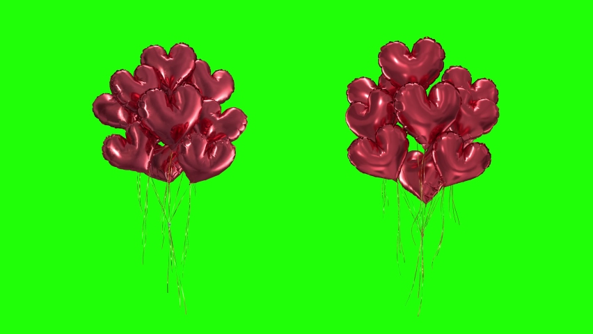 Loop Bundle of red heart-shaped balloons on a green background