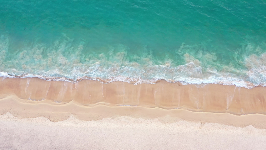 4K Aerial drone top view crowd of people at tropical Beach with sunset in Phuket, Thailand, Beautiful Phuket beach is famous tourist destination at Andaman sea. Top view happy people play on the beach | Shutterstock HD Video #1067426951