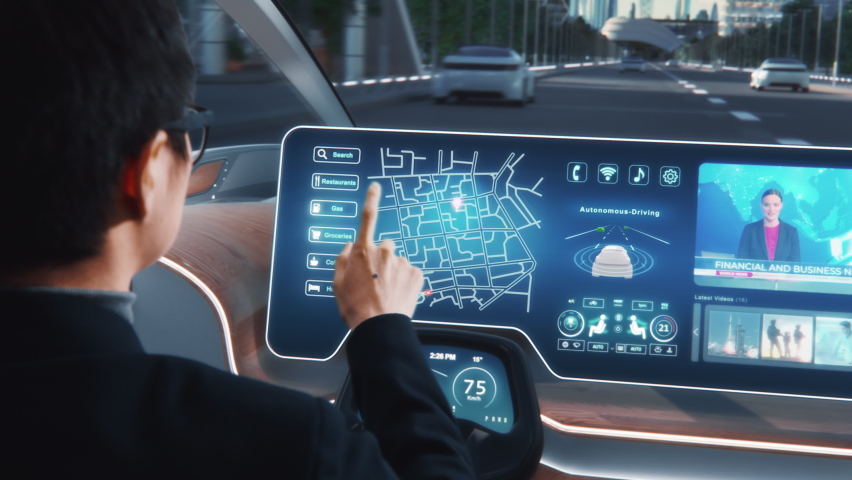 Futuristic Concept: Stylish Businessman Using Navigation App on an Augmented Reality Dashboard with Financial News Broadcast while Sitting in an Autonomous Self-Driving Zero-Emissions Electric Car.  Royalty-Free Stock Footage #1067430884