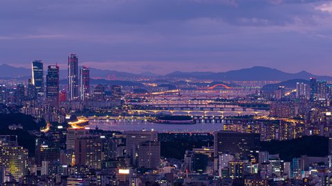 Day to night,Time lapse,Aerial view of Seoul city and Han river and sunset Sky,South Korea,Zoom out