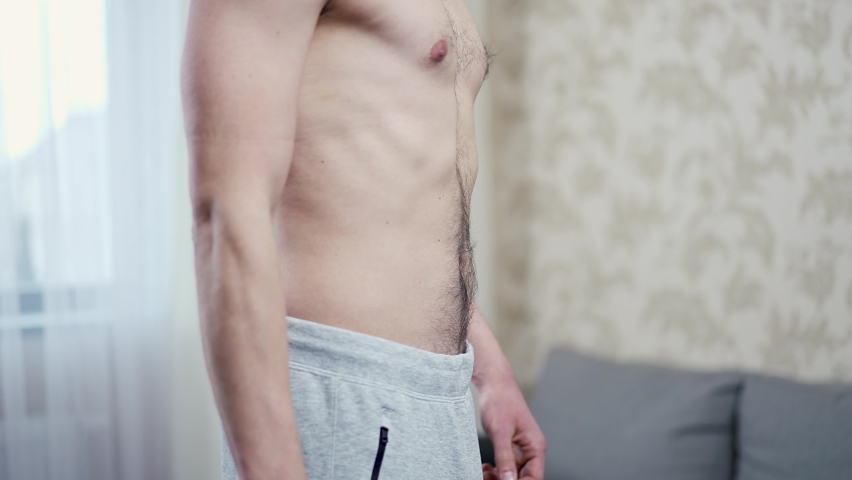 Man taking a picture of his penis with a smart-phone