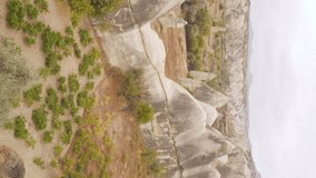Vertical video Cappadocia landscape aerial view. Turkey. Goreme National Park