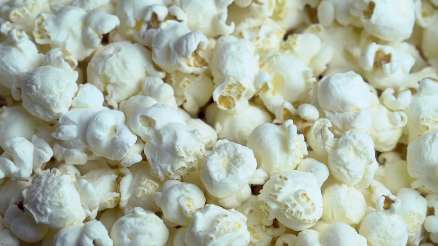 Delicious popcorns are turning around Royalty-Free Stock Footage #1067461118
