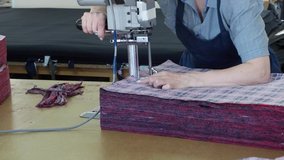 the sewing production of clothing, cutting