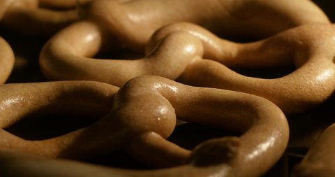 Delicious traditional German pretzels while baking go high in the oven in time lapse: stockvideo