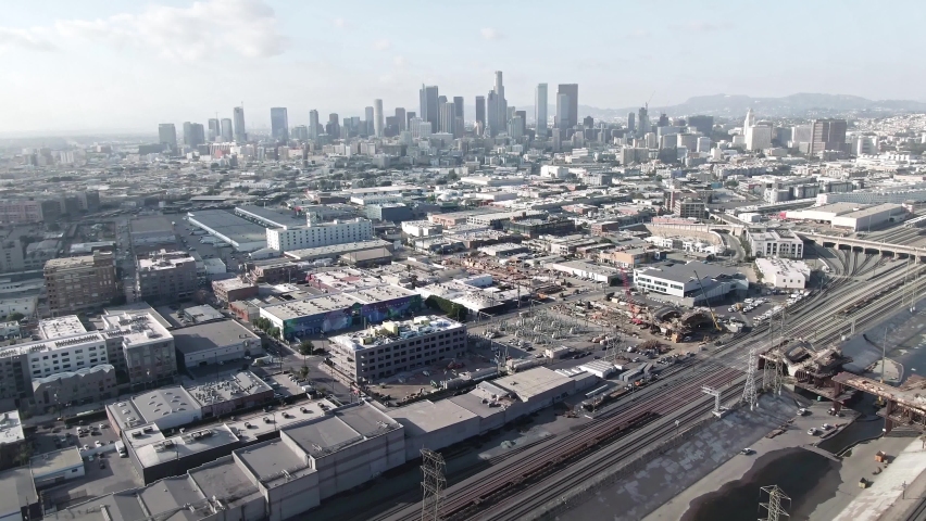 LOS ANGELES, CA, USA - Feb 15, 2021: Los Angeles Drone 4k. Aerial view of warehouses, office buildings, skyscrapers, downtown apartments in LA. Urban life, arts and fashion district of LA.