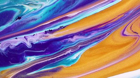 Fluid art drawing video, modern acryl texture with flowing effect. Liquid paint mixing artwork with splash and swirl. Detailed background motion with golden, blue and turquoise overflowing colors.