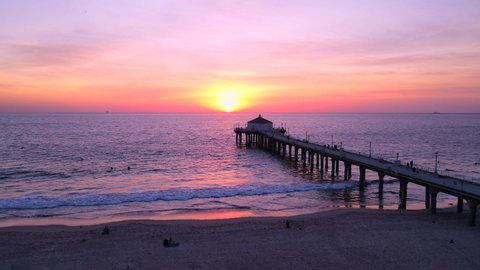 Manhattan Beach Pier Flyover during sunset in Los Angeles California