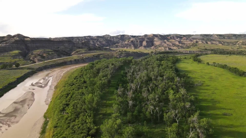 Flying towards Theodore Roosevelt National Park across the Little Missouri River on a summer day