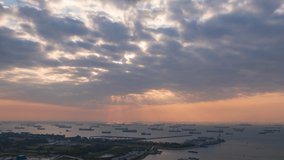Time-lapse video of Crepuscular rays in the morning off the ocean at Singapore strait. - Powered by Shutterstock - Get 15% off with code: PIKWIZARD15