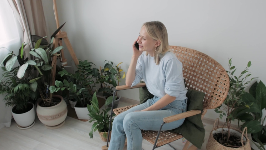 beautiful girl speaks by smartphone