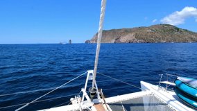 Sailing around the stunning island o Vulcano in the Eolian Islands, Sicily, and climbing up to the crater to soak in the amazing view. Series of camera and areal drone videos for storytelling