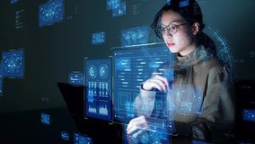 Young asian woman watching hologram screens. Business technology. - Powered by Shutterstock - Get 15% off with code: PIKWIZARD15