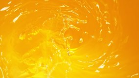 Super Slow Motion Shot of Pouring Fresh Orange Juice into Whirl at 1000 fps. - Powered by Shutterstock - Get 15% off with code: PIKWIZARD15