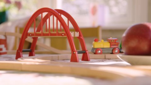 Hedemora , Dalarna , Sweden - 11 18 2020: A toy Brio train follows the track across a sunny table top