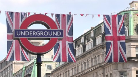 London , London , United Kingdom (UK) - 12 14 2020: London Underground sign and Union Jack