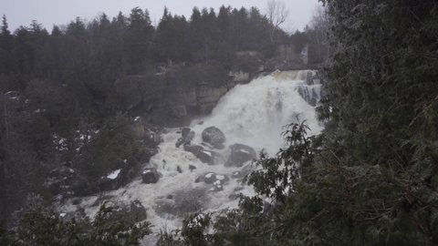 Water Flowing Over Inglis Falls In Canada, Beautiful Winter Landscape Destination
