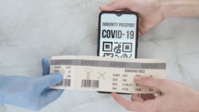 Digital covid immunity passport. Herd immunity passport. Hands in gloves top dawn shot. Antibody vaccine Modern medical technology. - Powered by Shutterstock - Get 15% off with code: PIKWIZARD15