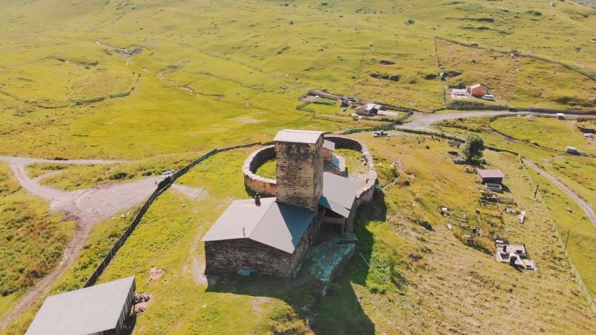 Aerial close up view of famous Lamaria monastery in Ushguli village. Upper svaneti architecture towers and culture