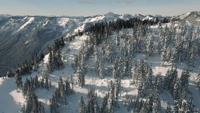 Sunny Winter Day Drone Video of Mountain Slopes with Fresh Powder Snow, Washington backcountry ski and snowboard terrain aerial view