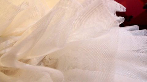A white cancan for regional festivals. A white cancan skirt with ruffles