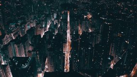 Cinematic drone shot of a city during the night giving that cyberpunk vibe. view of some crowded street with some advertising screen and neon light. - Powered by Shutterstock - Get 15% off with code: PIKWIZARD15