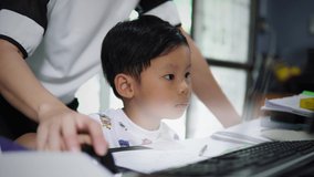 Asian little young boy student learning of the virtual display,Future technology concept. - Powered by Shutterstock - Get 15% off with code: PIKWIZARD15