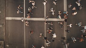 2019.06.11 - Kyiv city, Ukraine, Europe. Top down people cross road aerial. Cars stop let pedestrians crosswalk street. Cityscape traffic highway. Men, women walk at way. Lifestyle. Nature landscape - Powered by Shutterstock - Get 15% off with code: PIKWIZARD15