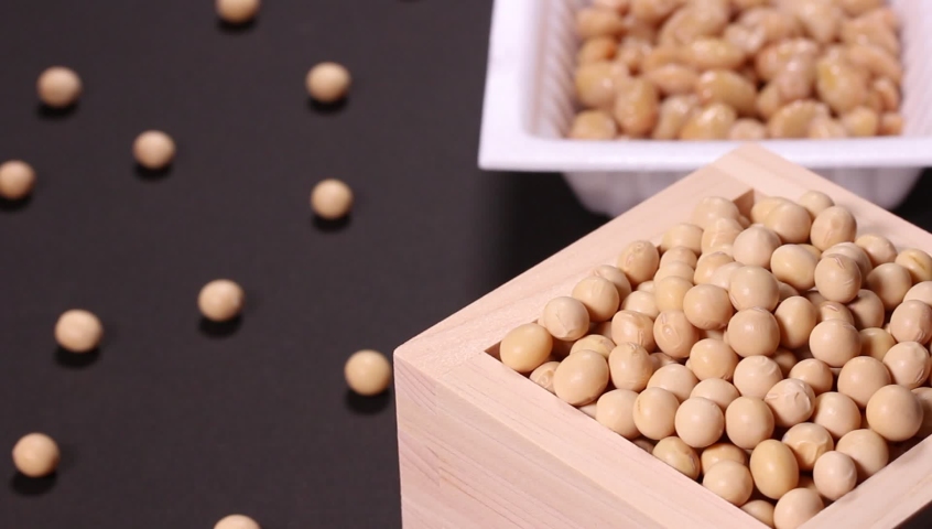 Natto in a pack and  Soybeans in a wooden box rotating Royalty-Free Stock Footage #1067627090