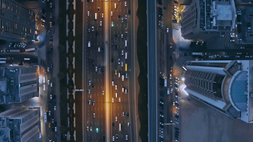 Aerial Drone Shot Autonomous Self Driving Cars Moving Through City Surveillance System Artificial Intelligence Scans Cars GPS Tracking Movement 5G Connection Satellite IoT Network | Shutterstock HD Video #1067634026