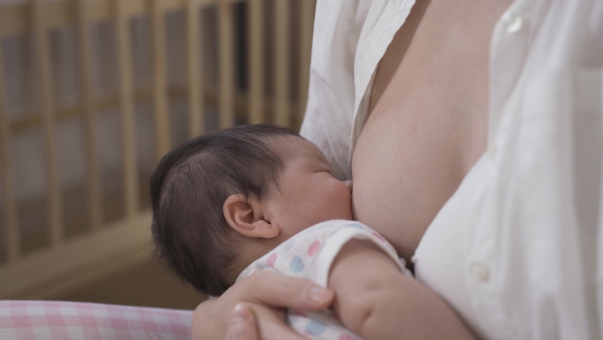 Girl Breastfeeding Puppy