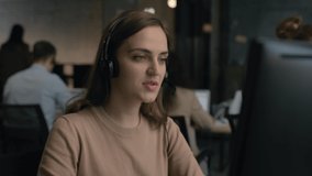 Call center and helpful customer service. Use desktop pc at computer table and phone line at modern co-working. Diverse group of workers talks on sale hotline. Busy seller at agency office close-up - Powered by Shutterstock - Get 15% off with code: PIKWIZARD15