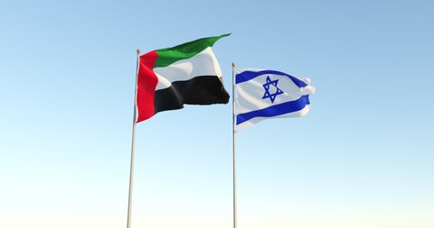 Israel and UAE flags waving together in the sky. International relations United Arab Emirates and Jerusalem signing diplomatic deal. Two flags at sky background.