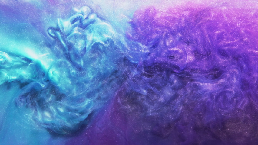 Color smoke flow. Ink swirl in water. Ethereal energy. Bright purple blue pigment glitter fume cloud mix dynamic texture abstract art background. Royalty-Free Stock Footage #1067687348