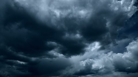 TIMELAPSE Dark sky cloud background Slow motion epic storm tropical sunset dark cloud stormy. digital cinema composition background evening fast moving away. global warming concept motion sky clouds