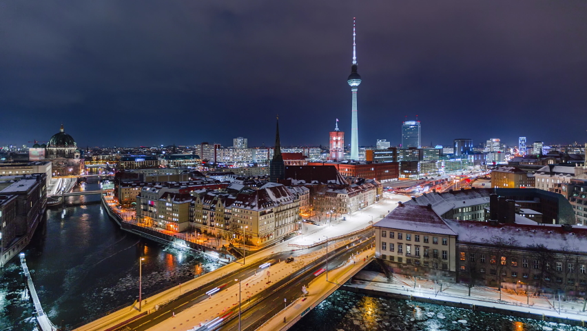 Snowy Night Time Lapse of Berlin Cityscape with TV Tower and Spree River, Berlin, Germany