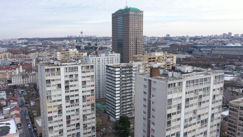 France, Paris suburb (Seine-Saint-Denis district), Aubervilliers, close-up on buildings. Drone aerial view.  Royalty-Free Stock Footage #1067705318