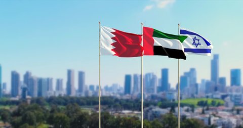 Bahrain Israel and UAE flags waving together in the sky. International relations. 