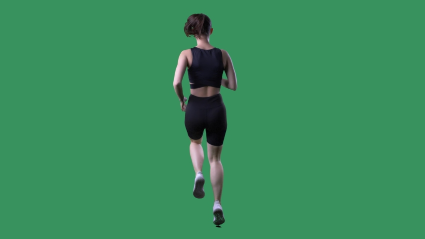 Back view slow motion of fitness woman doing high knee exercise. Full body on chroma key green screen. 