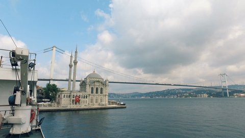 First Bosporus Bridge and Ortakoy Mosque in Istanbul. The Bosporus Bridge, also called the First Bosphorus Bridge or simply the First Bridge