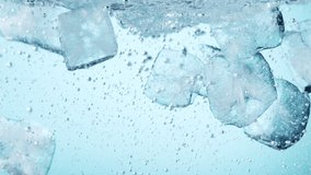 Super slow motion of rotating ice cubes in the water. Filmed on high speed cinema camera, 1000 fps. - Powered by Shutterstock - Get 15% off with code: PIKWIZARD15