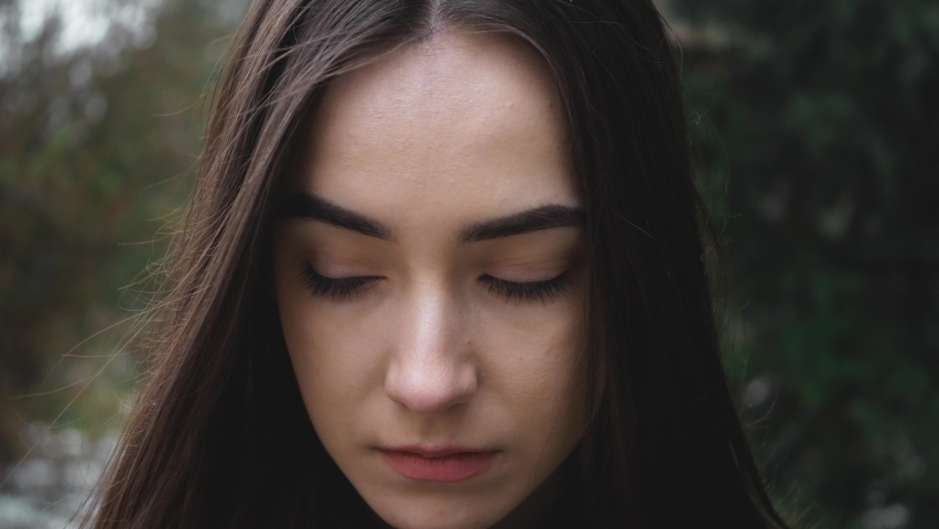 Portrait of beautiful young woman in nature woods. Connection with nature. | Shutterstock HD Video #1067750366